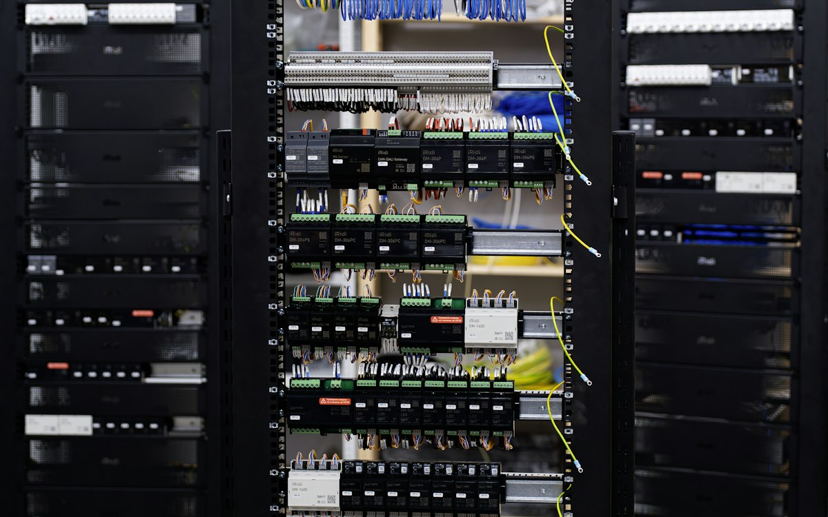 Open electrical control panel with DIN rail circuit breakers